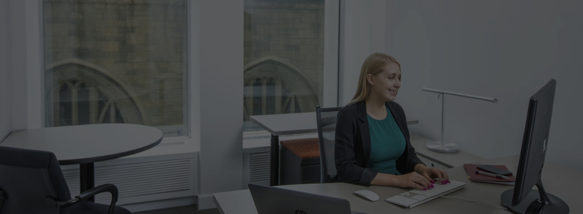Young woman working at desk